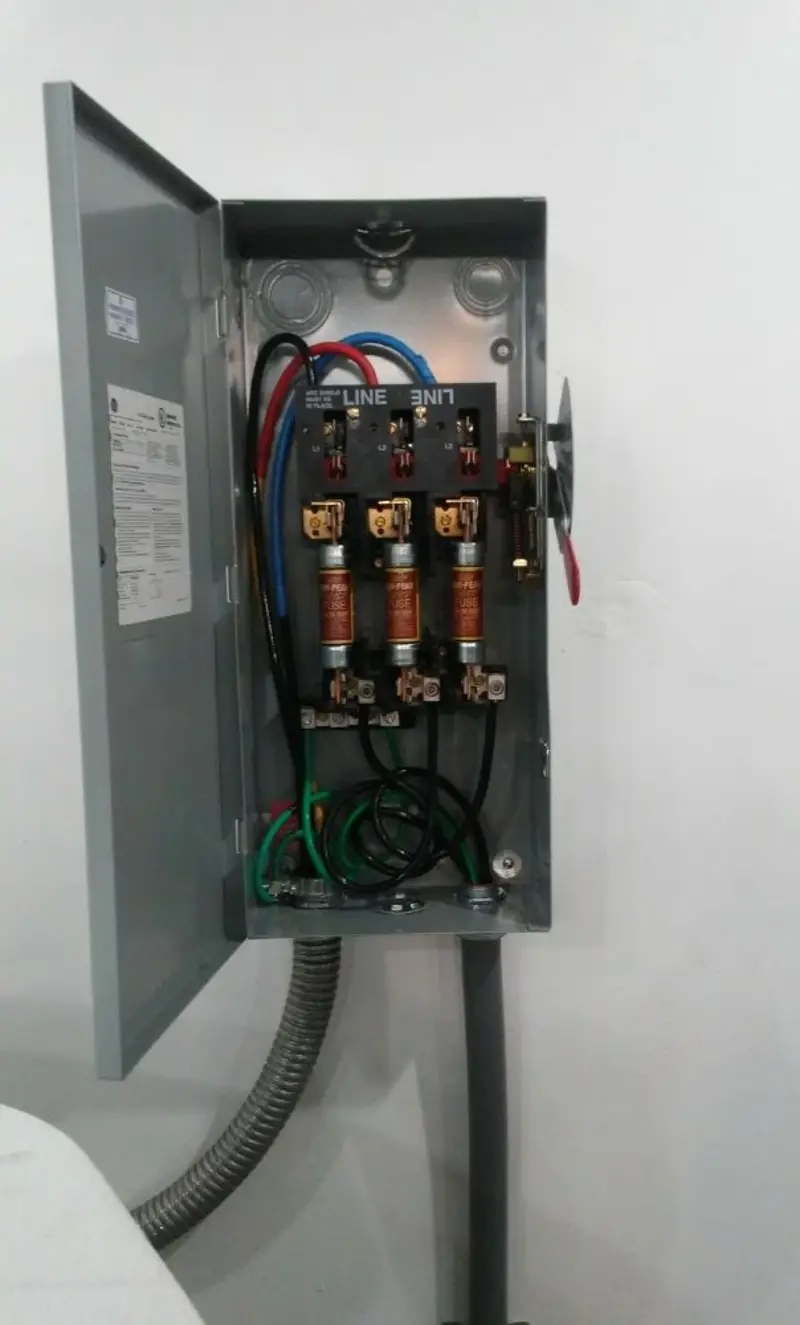 Three-phase disconnect switch installed for Smoke Detector Installation in Putney
